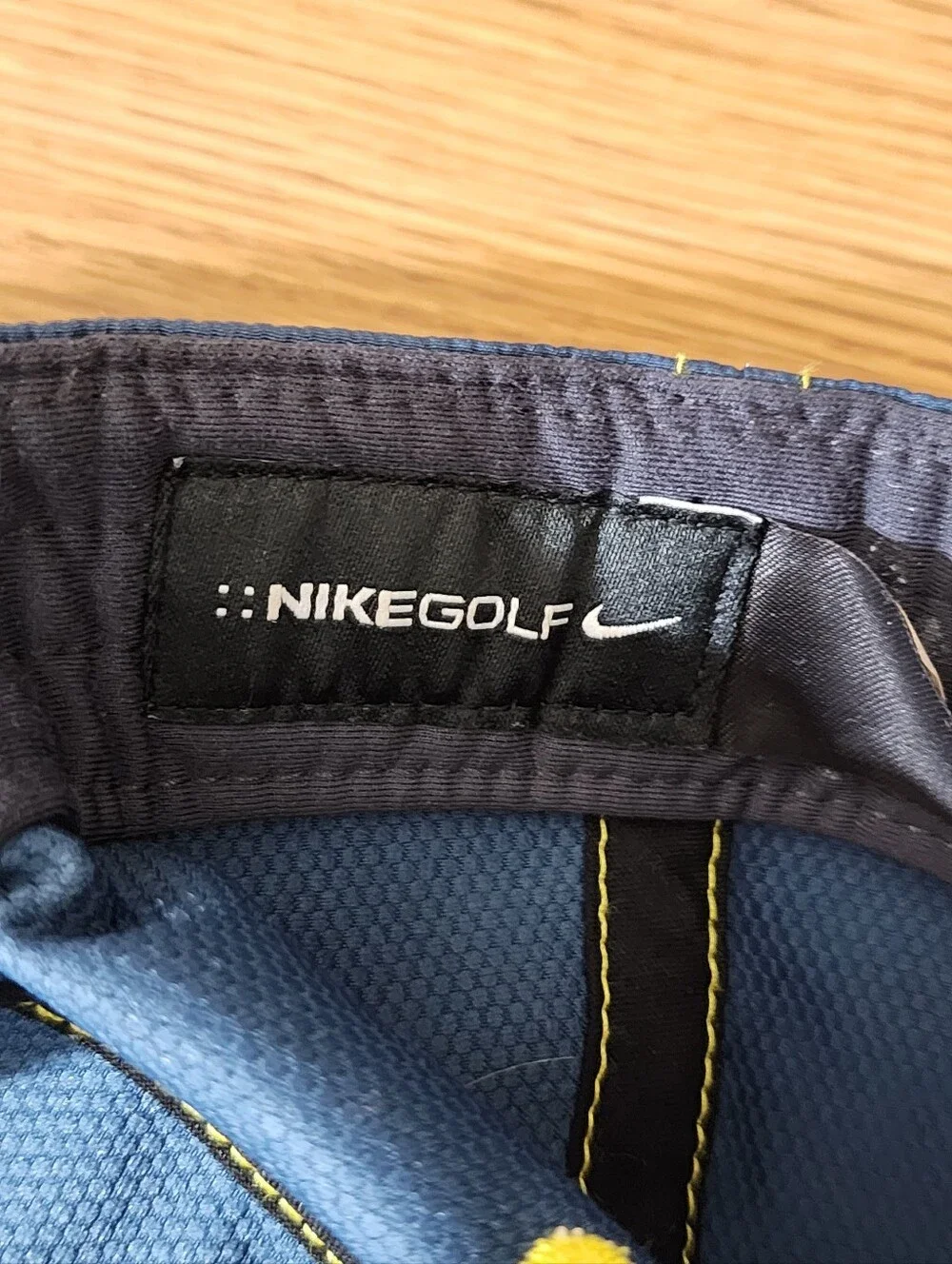 Nike Blue Cap with Yellow Accent Stitching and Logo